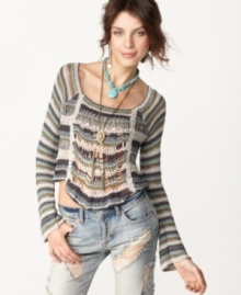 Free People's striped top is cropped with a totally casual look. Pair it with lived-in jeans and a bold necklace for a slightly edgy outfit.