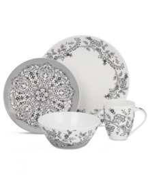 Oleg Cassini weaves a table of playful sophistication with the lacy flowers and dots of Ava dinnerware. Layer the varied black and white pieces for a casual setting that's altogether – and effortlessly – stylish. Oleg Cassini weaves a table of playful sophistication with the lacy flowers and dots of Ava dinnerware. Layer the varied black and white pieces for a casual setting that's altogether – and effortlessly – stylish.