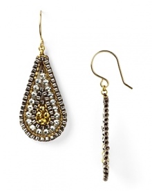 Miguel Ases gold-flecked earrings are a glamourous take on beads. Equal parts delicate and dramatic, these shapely teardrops beg for a bold lip and slinky gown.