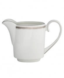 Fresh and cool in crisp white, the Silver Leaf creamer delivers modern style and iconic craftsmanship. Delicate feathered platinum applied using Wedgwood's signature technique shimmers with whimsy on sleek bone china. Fresh and cool in crisp white, the Silver Leaf creamer delivers modern style and iconic craftsmanship. Delicate feathered platinum applied using Wedgwood's signature technique shimmers with whimsy on sleek bone china.