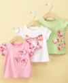 Frilly floral-patterned appliques add girlish appeal to this adorable shirt from First Impressions.