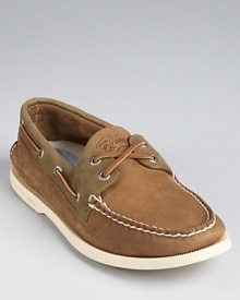 Classic boat shoes from the original, crafted in an easy-to-wear slip-on style with traditional lace and stitching detail and updated with contrast panels for more modern appeal. Classic boat shoes from the original, crafted in an easy-to-wear slip-on style with traditional lace and stitching detail and updated with contrast panels for more modern appeal.