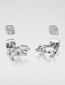Shiny sterling silver cuff links in a moneyed bull & bear design.Sterling silverAbout .87 diam.Made in USA Shiny sterling silver cuff links in a moneyed bull & bear design.Sterling silverAbout .87 diam.Made in USA