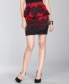 A petite lace-print peplum skirt from INC adds a seductive touch to your evening looks.