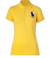 Detailed in breathable cotton stretch mesh, Ralph Laurens big pony polo is a cool modern take on this iconic style - Small collar, button placket, short sleeves, oversized shiny royal blue embroidered polo player at chest, slit sides, high-low hemline - Slim fit - Wear with your favorite jeans and just as bright loafers