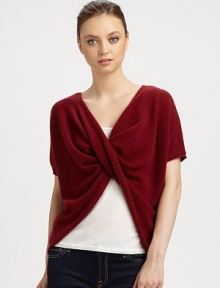 This v-neck, twist-front cashmere topper is perfect for snuggling luxuriously.CashmereShort sleevesPullover styleHand wash or dry cleanImported This v-neck, twist-front cashmere topper is perfect for snuggling luxuriously.CashmereShort sleevesPullover styleHand wash or dry cleanImported