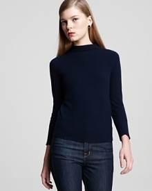 A pop of pink highlights zips through the back of this super chic DIANE von FURSTENBERG sweater. A pop of pink highlights zips through the back of this super chic DIANE von FURSTENBERG sweater.