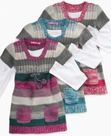 A style that will warm her up when the cold weather hits, this layered tunic sweater from Energie gives her an extra-lovely, unique style. A style that will warm her up when the cold weather hits, this layered tunic sweater from Energie gives her an extra-lovely, unique style.