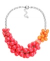 Style that pops! Haskell's bubblegum-colored statement necklace features fuchsia and orange striped beads set in silver tone mixed metal. Approximate length: 17 inches + 3-inch extender. Approximate drop: 1-1/4 inches.