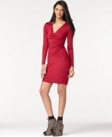 The long sleeve wrap dress from Bar III will absolutely have all eyes on you. Perfect for a holiday party, the fitted silhouette just loves your curves!