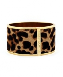 Feline ferocity. Vince Camuto's wild style features a chic cuff bracelet wrapped with a leopard print pony skin surface. Crafted in gold tone mixed metal. Approximate diameter: 2 inches. Feline ferocity. Vince Camuto's wild style features a chic cuff bracelet wrapped with a leopard print pony skin surface. Crafted in gold tone mixed metal. Approximate diameter: 2 inches.