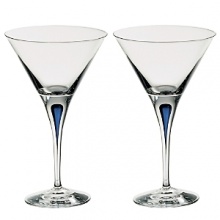Orrefors Intermezzo Blue Collection designed by Erika Lagerbielke. From the name synonymous with unique and luxurious art glass, Orrefors' Intermezzo Blue has a distinct teardrop of blue in the stem. Orrefors Intermezzo Blue Collection designed by Erika Lagerbielke. From the name synonymous with unique and luxurious art glass, Orrefors' Intermezzo Blue has a distinct teardrop of blue in the stem.