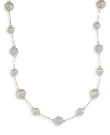 Decorate yourself with the ultimate in elegance. This light illusion necklace by Carolee features glass pearls and crystal fireballs suspended from a delicate chain crafted in mixed metal. Approximate length: 16 inches. Decorate yourself with the ultimate in elegance. This light illusion necklace by Carolee features glass pearls and crystal fireballs suspended from a delicate chain crafted in mixed metal. Approximate length: 16 inches.