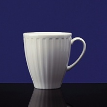 Simple shapes of crisp white are accented with precisely etched lines. Contrasting black matte jasper accessories with glazed interiors are also available. Bone china. Simple shapes of crisp white are accented with precisely etched lines. Contrasting black matte jasper accessories with glazed interiors are also available. Bone china.