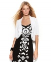 With a wavy cropped hemline and pretty open knit, INC's petite sweater is the perfect finishing touch to a spring dress or a colorful tank and skinny jeans.