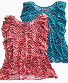 Lightweight and ruffly, this fun top from Epic Threads gives her look an edge, thanks to the sharkbite hem. Lightweight and ruffly, this fun top from Epic Threads gives her look an edge, thanks to the sharkbite hem.
