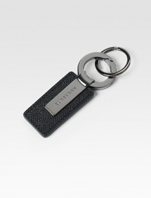 Sleek design of textured leather and metal accented with engraved signature logo.About 4 longMade in Italy Sleek design of textured leather and metal accented with engraved signature logo.About 4 longMade in Italy