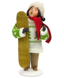 She's graduated from the bunny slopes and now this snowboarder, clad in a can't-miss Christmas sweater, stands in awe of the snow-capped mountains around her. The perfect Byers' Choice figurine for ski- and snowboarding families!