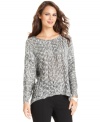 Alfani makes this sweater fashion-forward with a striking marled knit and a modern high-low hem.