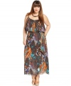 Have all eyes on you in Baby Phat's sleeveless plus size maxi dress, flaunting a peacock print!