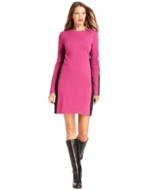 MICHAEL Michael Kors gives this petite ponte dress a sporty finish with stripes on the sleeves and sides. MICHAEL Michael Kors gives this petite ponte dress a sporty finish with stripes on the sleeves and sides.