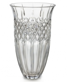 Narrow flutes and a diamond grid converge in pristine Waterford crystal, gracing the Shelton vase with old-world resplendency. A beautiful host for fresh flowers in your own home – or a memorable gift for someone you love. Shown left.