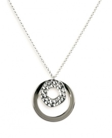For style that's out of this universe -- try this chic, orbital pendant by Nine West! Two graduated circles shine in silver tone mixed metal and textured silver tone mixed metal. Approximate length: 18 inches. Approximate drop: 1-1/10 inches. For style that's out of this universe -- try this chic, orbital pendant by Nine West! Two graduated circles shine in silver tone mixed metal and textured silver tone mixed metal. Approximate length: 18 inches. Approximate drop: 1-1/10 inches.