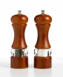 Add depth to any dish and décor with classic salt and pepper mills interpreted for the contemporary kitchen. The tall, beautifully contoured bodies are finished in elegant walnut, offset with a see-through stripe of acrylic that lets you view the mill's contents. Limited lifetime warranty. Add depth to any dish and décor with classic salt and pepper mills interpreted for the contemporary kitchen. The tall, beautifully contoured bodies are finished in elegant walnut, offset with a see-through stripe of acrylic that lets you view the mill's contents. Limited lifetime warranty.