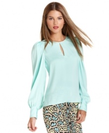 A keyhole cutout adds eye-catching detail to this vintage-inspired BCBGMAXAZRIA blouse -- perfect for ladylike appeal!