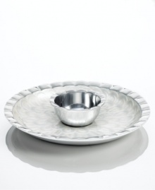 Full of surprises, this handcrafted chip and dip from the Simply Designz collection of serveware and serving dishes features sleek, polished aluminum with a fluted edge that echoes the scalloped pattern inside the serving plate. A beautiful way to entertain! Full of surprises, this handcrafted chip and dip from the Simply Designz collection of serveware and serving dishes features sleek, polished aluminum with a fluted edge that echoes the scalloped pattern inside the serving plate. A beautiful way to entertain!