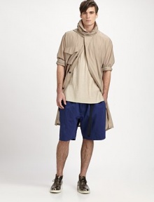 This lightweight wonder in pure silk offers lots of options of form and function, with its removable hood and convertible length.Zip-off hood with extended snap tabZip-up convertible collarHidden front zip under placketChest flap, side welt pocketsDrawstring waistRemovable side/back extender panelFully linedAbout 41½ from shoulder to hemSilkDry cleanImported This lightweight wonder in pure silk offers lots of options of form and function, with its removable hood and convertible length.Zip-off hood with extended snap tabZip-up convertible collarHidden front zip under placketChest flap, side welt pocketsDrawstring waistRemovable side/back extender panelFully linedAbout 41½ from shoulder to hemSilkDry cleanImported