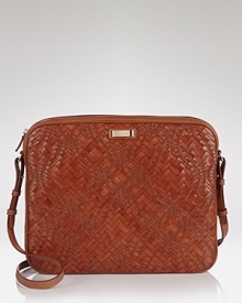 Cole Haan proves that practicality can have a luxurious side with this woven laptop bag. Boasting custom hardware and a field-tested look, it will add a dash of opulence to office ensembles. Cole Haan proves that practicality can have a luxurious side with this woven laptop bag. Boasting custom hardware and a field-tested look, it will add a dash of opulence to office ensembles.