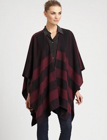 Signature check pattern is printed on sumptuous cashmere in a cape silhouette.Cashmere66 X 47Open frontDry cleanImported Signature check pattern is printed on sumptuous cashmere in a cape silhouette.Cashmere66 X 47Open frontDry cleanImported