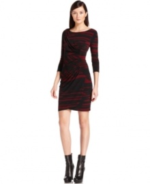 With a gorgeous gathered silhouette and gemstone-hued print, Calvin Klein's dress is stunning for day or night.