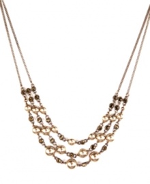 Mocha glass pearls and smokey quartz-colored crystals are intricately intertwined in this elegant necklace from Givenchy. Crafted in brown gold tone mixed metal. Approximate length: 16 inches + 2-inch extender. Mocha glass pearls and smokey quartz-colored crystals are intricately intertwined in this elegant necklace from Givenchy. Crafted in brown gold tone mixed metal. Approximate length: 16 inches + 2-inch extender.
