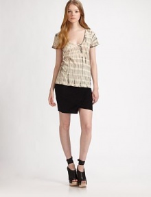 Strategically placed ruching and a trend-worthy asymmetrical hemline make this skirt is a must-have. Elastic waistbandFront fold-over layerSide ruchingAsymmetrical hemAbout 20 from natural waist93% cotton/7% polyesterMachine washMade in USAModel shown is 5'10 (177cm) wearing US size Small. Strategically placed ruching and a trend-worthy asymmetrical hemline make this skirt is a must-have. Elastic waistbandFront fold-over layerSide ruchingAsymmetrical hemAbout 20 from natural waist93% cotton/7% polyesterMachine washMade in USAModel shown is 5'10 (177cm) wearing US size Small.