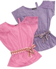 Trendy tee. This shirt from Jessica Simpson takes a basic tee shirt and makes it modern with a crocheted shoulder and tie to cinch the waist. Trendy tee. This shirt from Jessica Simpson takes a basic tee shirt and makes it modern with a crocheted shoulder and tie to cinch the waist.