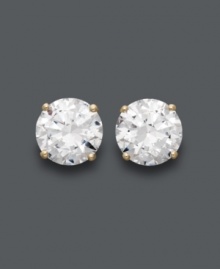 A must-have for every girl's collection -- a simple pair of stud earrings that sparkle in the light. Arabella's luminous design highlights round-cut Swarovski zirconias (6-5/8 ct. t.w.) set in 14k gold. Approximate diameter: 8 mm.