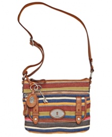 Outfitted in a unique, colorful print with vintage-inspired details, this irresistible crossbody from Fossil is the silhouette of the season. Polished silver-tone hardware and soft, pebbled leather accent the exterior, while plenty of pockets and compartments organize the inside. Outfitted in a unique, colorful print with vintage-inspired details, this irresistible crossbody from Fossil is the silhouette of the season. Polished silver-tone hardware and soft, pebbled leather accent the exterior, while plenty of pockets and compartments organize the inside.
