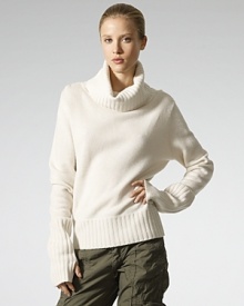 Crafted in a luxe blend of cashmere and wool, the classic turtleneck sweater exudes ultimate comfort and style. Crafted in a luxe blend of cashmere and wool, the classic turtleneck sweater exudes ultimate comfort and style.