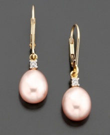 Charming earrings comprised of pink pear-shaped cultured freshwater pearls and pretty diamond accents. Set in 14k gold. Charming earrings comprised of pink pear-shaped cultured freshwater pearls and pretty diamond accents. Set in 14k gold.