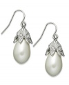 Understated elegance. Lauren by Ralph Lauren's Town & Country drop earrings are crafted from brass with a glass pearl descending for a classic touch. Approximate drop: 2-1/4 inches.