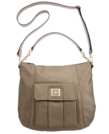 A trio of key features make the Trinity from AK Anne Klein your next go-to purse: a front flap pocket, the trendy pebbled texture and the adjustable crossbody strap. A trio of key features make the Trinity from AK Anne Klein your next go-to purse: a front flap pocket, the trendy pebbled texture and the adjustable crossbody strap.