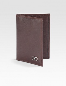 Single-fold wallet accented with signature double gancini silver ornament detail.Four card slotsLeather4W x 3HMade in Italy Single-fold wallet accented with signature double gancini silver ornament detail.Four card slotsLeather4W x 3HMade in Italy