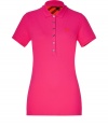 Luxe polo in fine, bright pink cotton stretch blend - Traditional button down style with short, fitted sleeves and small collar - Contrast embroidered  logo at chest - New, lengthier cut is slim and hits below the hips - Chic, Burberry check motif lining at nape of the neck - A dream basic as versatile as it is stylish - Pair with a blazer and leather pencil skirt or layer beneath a cardigan and wear with skinny jeans