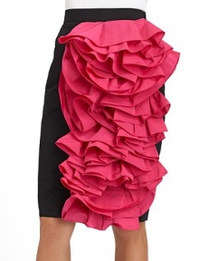 THE LOOKNarrow waistbandBright voluminous ruffles adorn one sideSide zipper with hook-and-eyeTHE FITAbout 24 longTHE MATERIAL59% polyester/41% acetateFully linedCARE & ORIGINDry cleanMade in Italy
