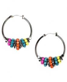 Plain hoops are so last year, spice it up with a splash of color! Nine West's eye-catching style features hot pink, turquoise, orange and yellow plastic beads set in hematite-plated mixed metal. Approximate drop: 1 inch.