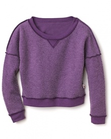 A fun, funky sweatshirt with an inside-out look. Reversed seams, a weathered heather body and v-neck inset give it that borrowed for big-sister look. A fun, funky sweatshirt with an inside-out look. Reversed seams, a weathered heather body and v-neck inset give it that borrowed for big-sister look.
