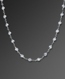 Crafted in platinum over sterling silver and embellished with sparkling cubic zirconias (13 ct. t.w.), CRISLU's long necklace is both timeless and versatile. Approximate length: 18 inches. Crafted in platinum over sterling silver and embellished with sparkling cubic zirconias (13 ct. t.w.), CRISLU's long necklace is both timeless and versatile. Approximate length: 18 inches.