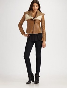 A closely-cropped silhouette of rich leather, finished with lush shearling trim and a removable knit collar.Genuine natural shearling collar with removable knit layerAsymmetrical front zipperWelt pocketsWool knit panelsAbout 20 from shoulder to hemLeather body; wool/acrylic panelsDry clean by a leather specialistImportedFur origin: UruguayPlease note: Due to the natural nature of the shearling A closely-cropped silhouette of rich leather, finished with lush shearling trim and a removable knit collar.Genuine natural shearling collar with removable knit layerAsymmetrical front zipperWelt pocketsWool knit panelsAbout 20 from shoulder to hemLeather body; wool/acrylic panelsDry clean by a leather specialistImportedFur origin: UruguayPlease note: Due to the natural nature of the shearling